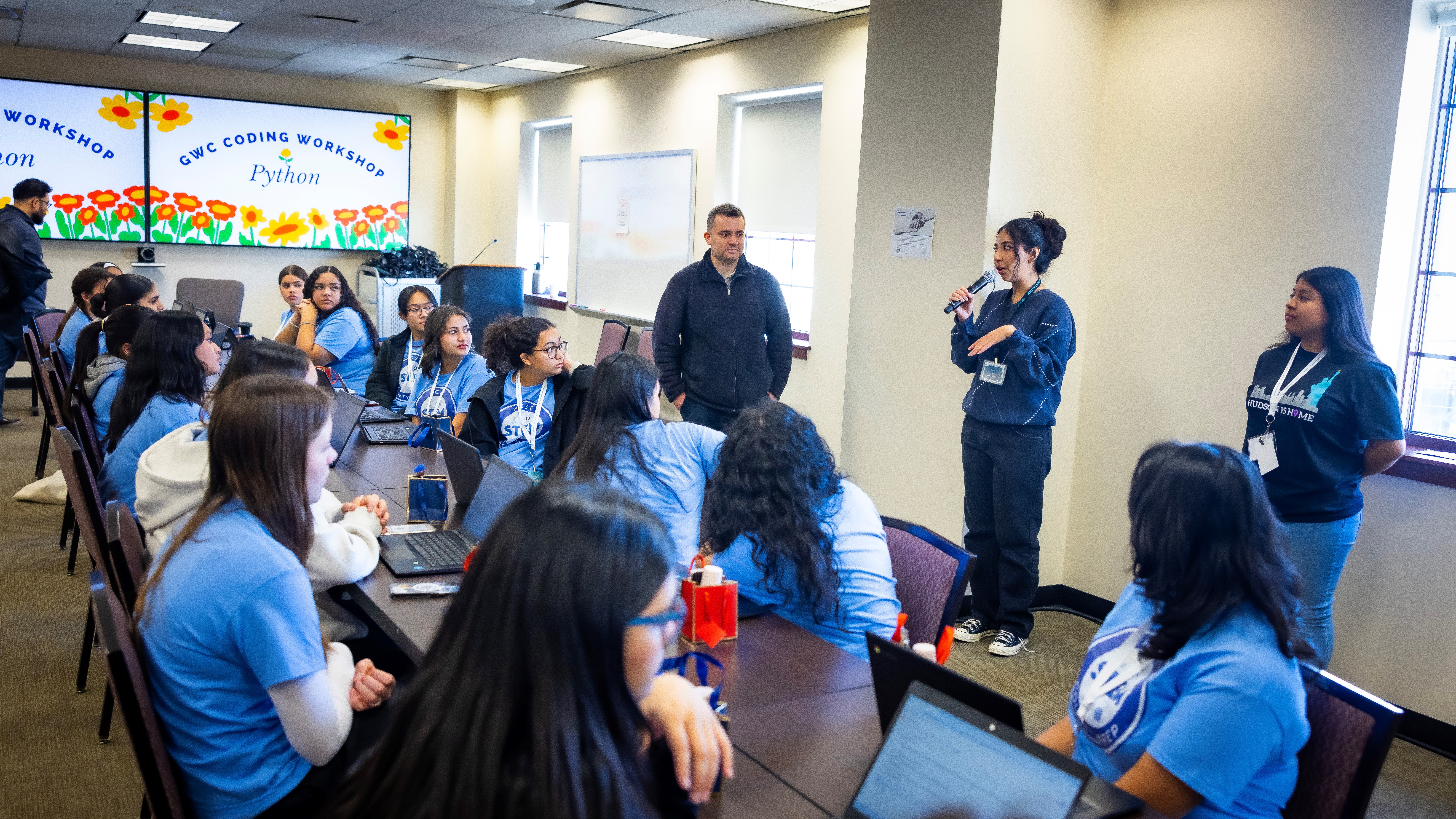 Girls Who Code club advisor Raffi Manjikian and HCCC students from the Girls Who Code Club give local students a crash course on Python at HCCC’s Girls in Technology Event. 