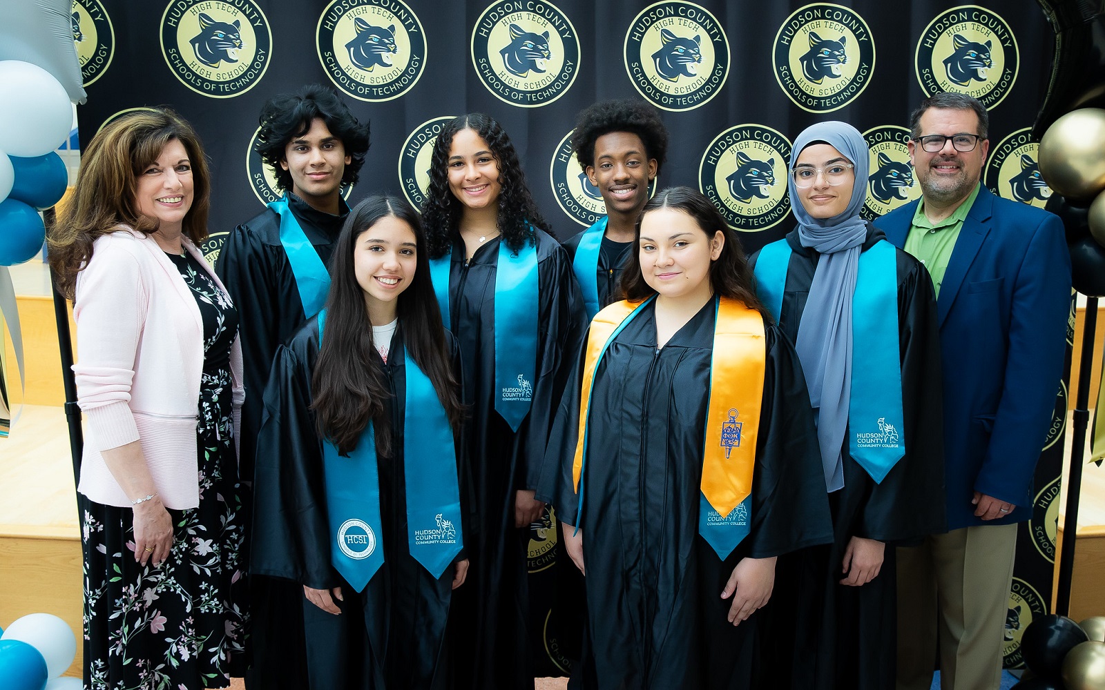 Hudson County’s High Tech High School celebrate graduation with HCCC faculty and staff.